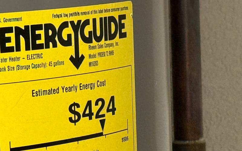 Yellow EnergyGuide label on a water heater