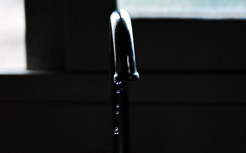 Water dripping from a faucet